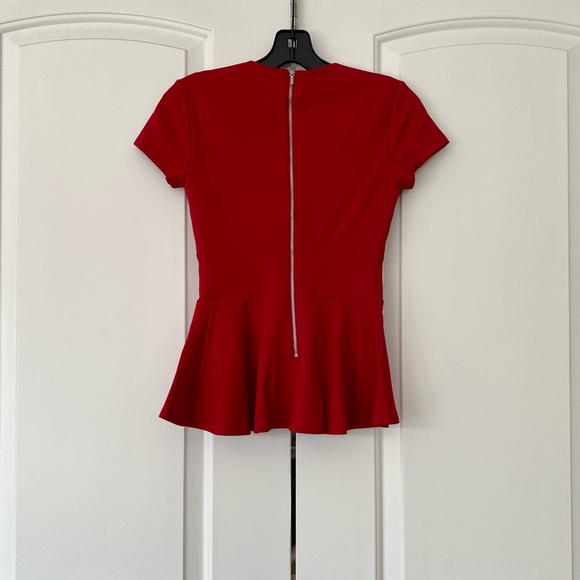 bebe Sweetheart Open Neck Peplum Top - Picture 2 of 5